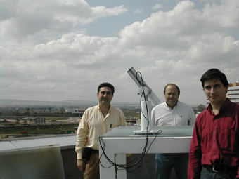 A close view of the instrument with part of the research team.