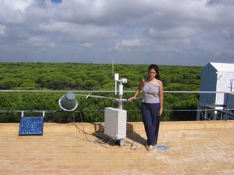 A view of the sunphotometer and site manager with the Donana National Park in the background.