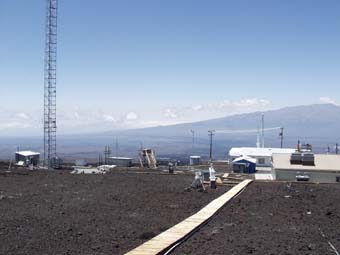 Sunphotometer pad is located to the right of the 40 meter tower in the picture.