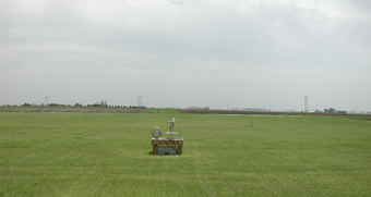 A grassy area next to Iowa State Universitys Agricultural Experiment Station.