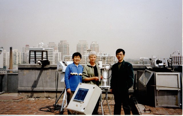 Zhang Wenxing, Bernadette Chatenet, and Hong Bin Chen with the sun photometer in Beijing, China