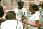 Students using a hazemeter to measure aerosols