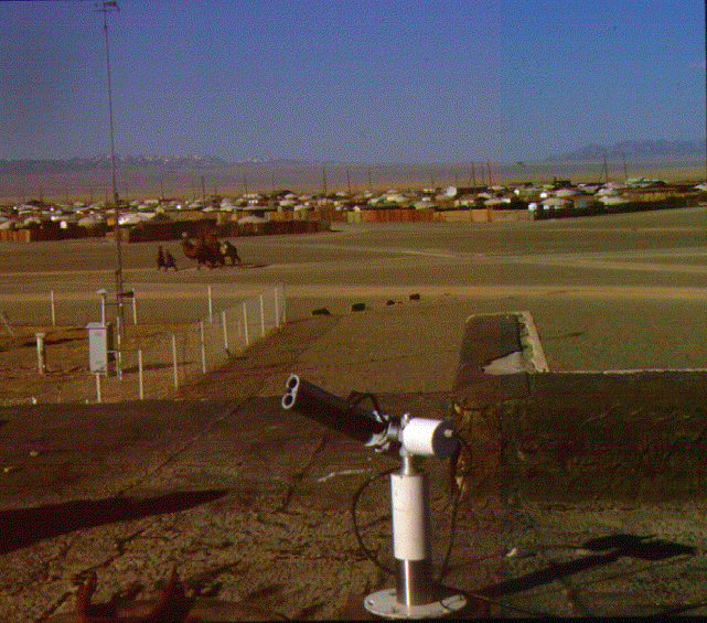 A view of the sun photometer and a view from the site