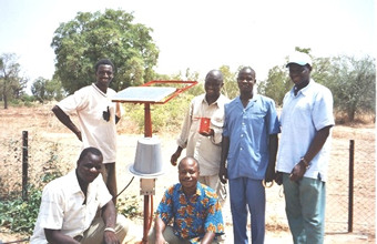from left to right, standing:Issa Kone (local site operator), Tintin (driver, painter and welder), Modibo Coulibaly (local site operator) and Samba Traore, the Cinzana station Director in front: Soumelah Dagnon (mazon) and Brahima S�kouCoulibaly (the Cinzana station manager)