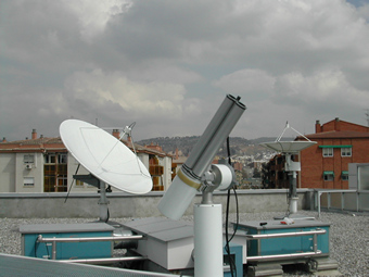 A view of the instrument from the Southwest with the AVHRR and METEOSAT Antennas.