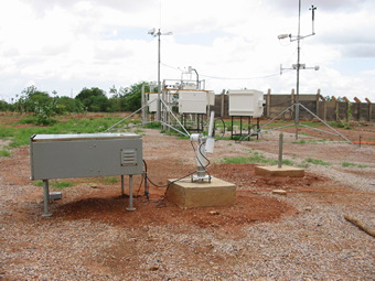 Photo of the sunphotometer at Niamey.  Other ARM/AMF instrumentation are visible in the background.