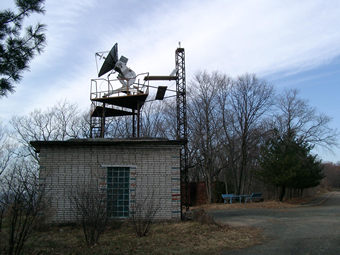 Photometer on metal tower