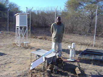 A view of the site manager Mr. Walter Kubheka with the sunphotometer site at Kruger National Park in Skukuza, South Africa 