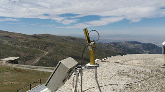 View of the photometer. Granada city can be observed in the image below the mountain.