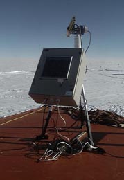A view of the sunphotometer set up on the roof of a container, close to the Dome C summer Camp. The instrument is looking at the sky, on January 25th 2003.