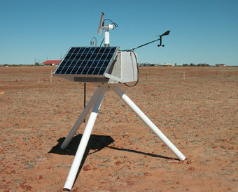 Photo of the sunphotometer in a weather station enclosure at a local airport.