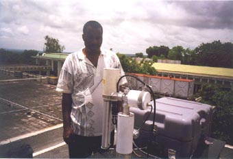 A technician stands by the sunphotometer.