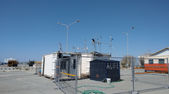 General view of the A-LIFE containers with in-situ aerosol instrumentation and the Cimel on top
