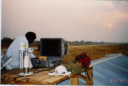 A view of the sunphotometer atop a roof site in Sesheke, Zambia.