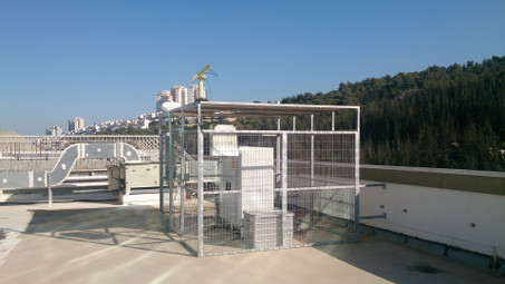 Sun photometer #649 at Technion in Haifa / Israel. The fence houses a Raman lidar system PollyXT from TROPOS.