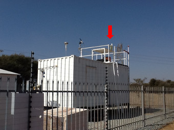 Welgegund Measurement Station showing the sunphotometer (Red arrow) on top of the container